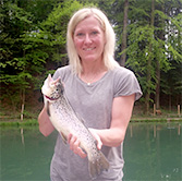 Olympiasiegerin Andrea Fischbacher mit Bachforelle